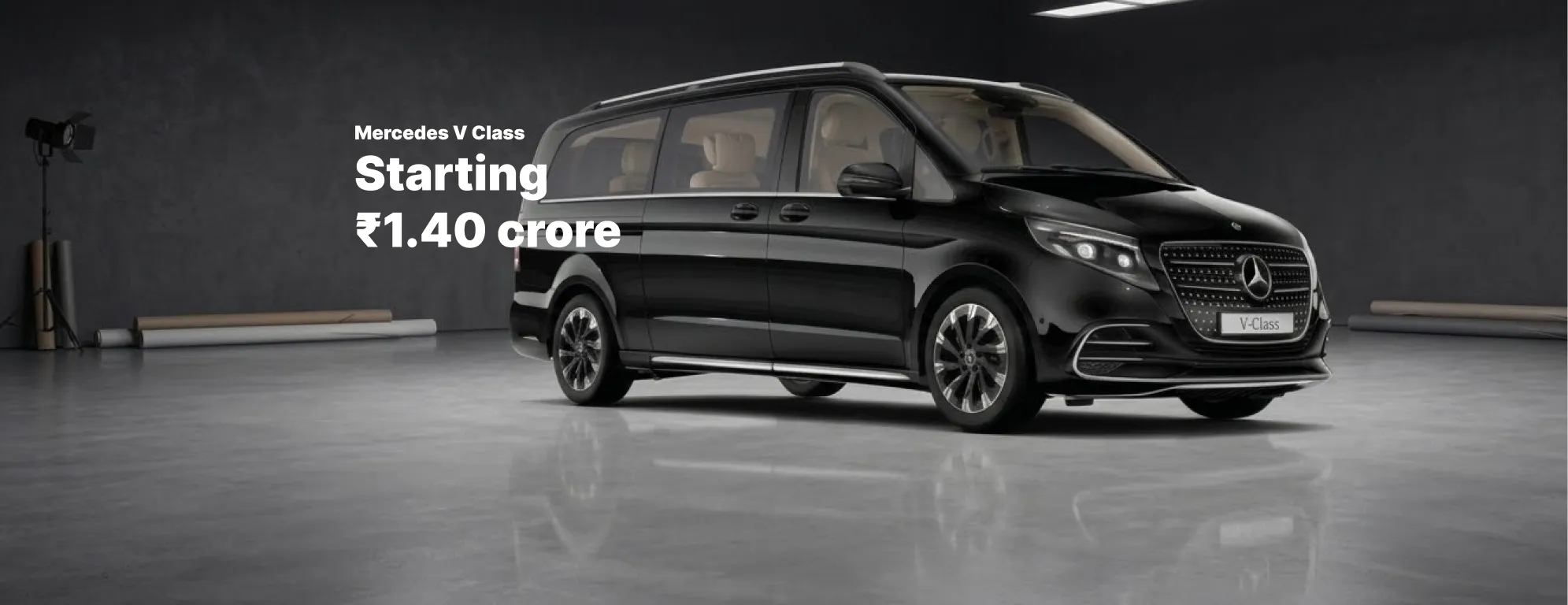 Banner Mercedes V Class in black color in a studio